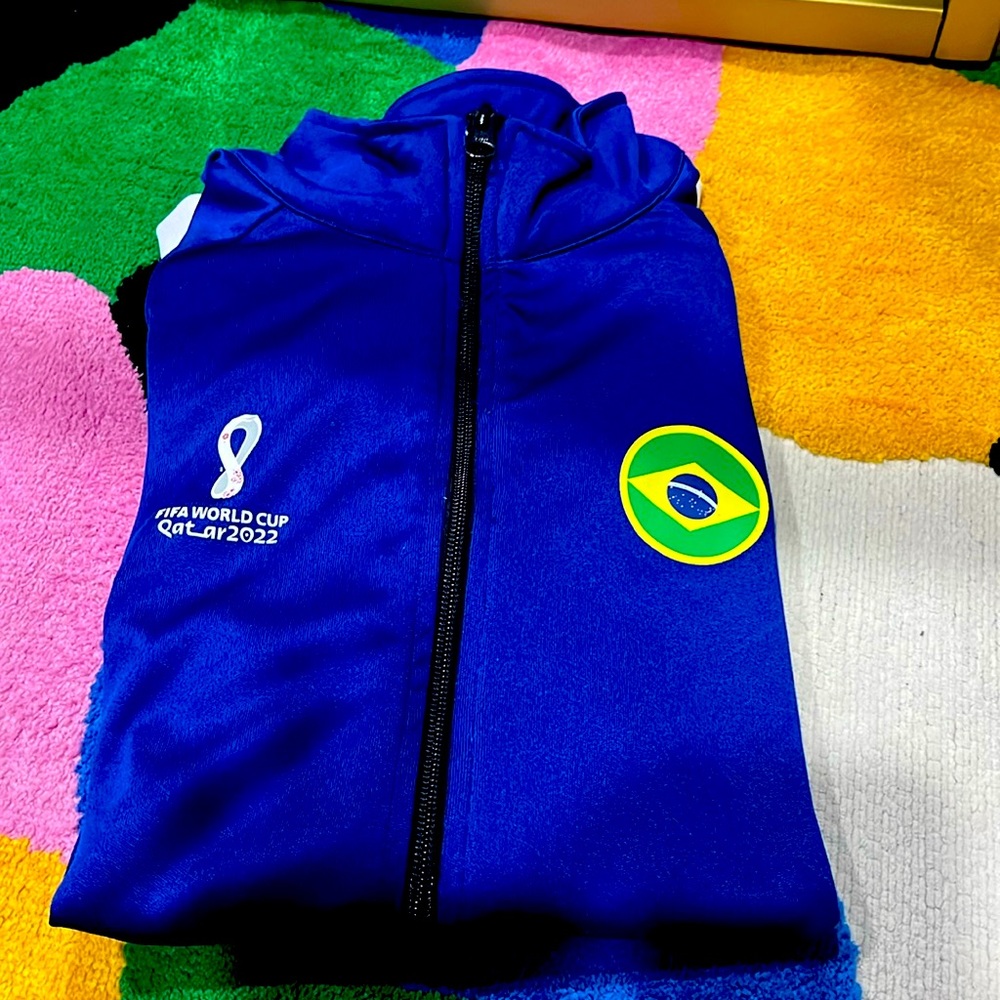 Gently used zip up for men 100% authentic for soccer fans